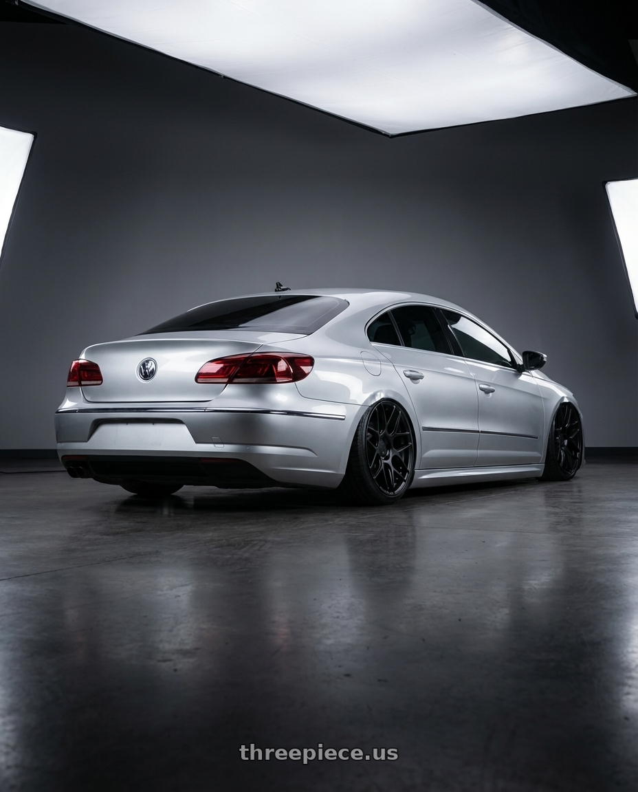 2015 Volkswagen CC with Aodhan AFF2 5x112 19x8.5+35 Matte Black wheels rear three quarter view slight stretch tires