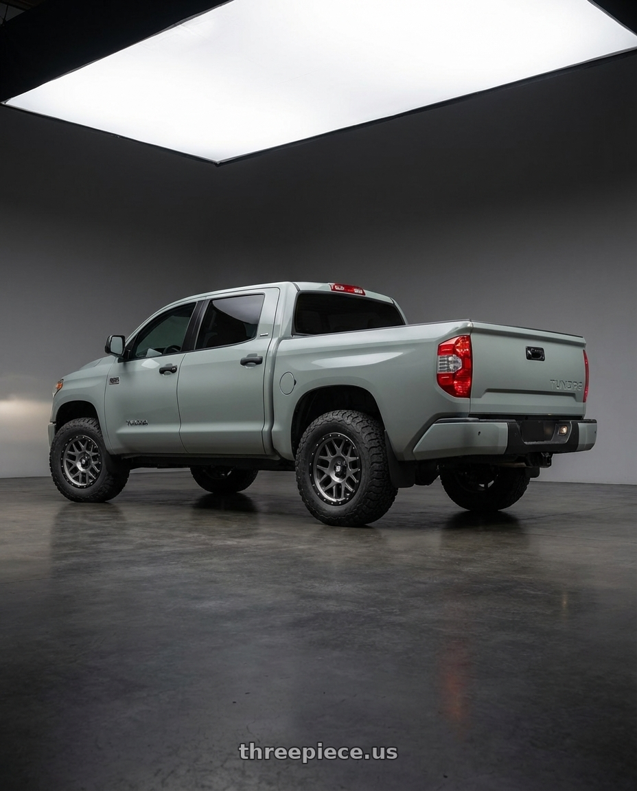 2018 Toyota Tundra with XD XD127 BULLY 5X150 20X9 +25 MATTE GRAY BLACK RING wheels rear three quarter view meaty tires