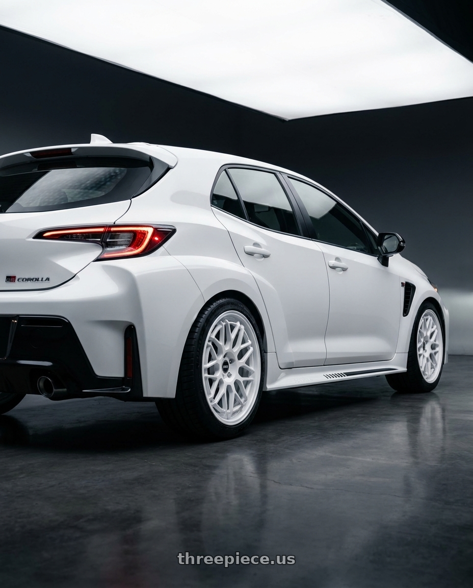 2026 Toyota GR Corolla with ESR Wheels APEX SERIES APX01 5x114.3 18x8.5 +30 Gloss White wheels rear three quarter view square tires