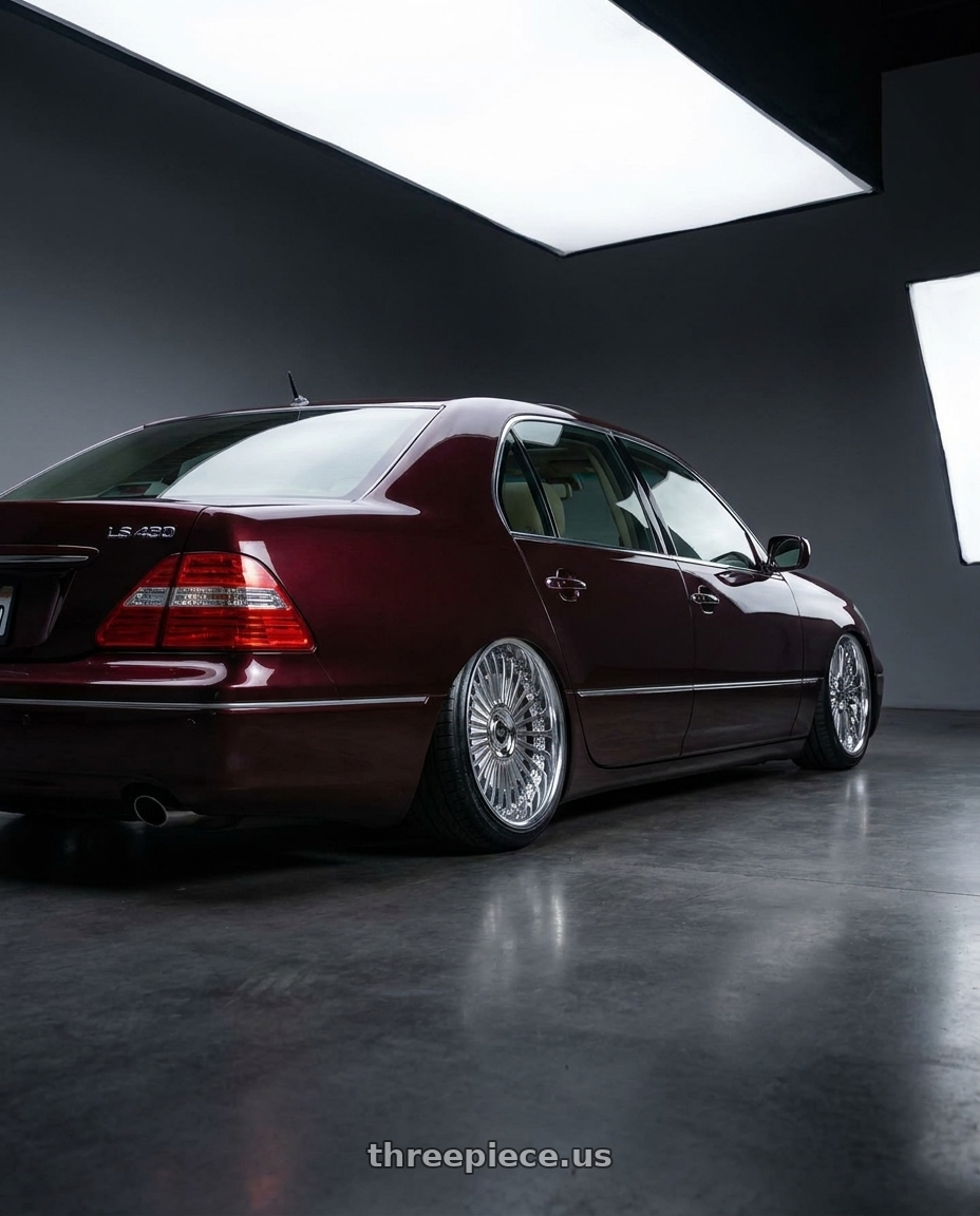2005 Lexus LS430 with Work Emitz Chrome 5x114.3 19x9.0 +38 wheels rear three quarter view slight stretch tires