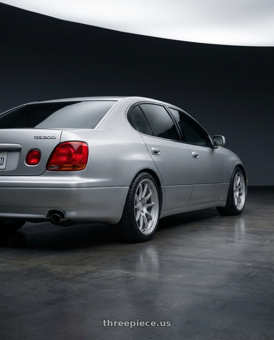 2001 lexus gs300  with Enkei Kojin 5x114.3 18x9.5+30 Matte Silver wheels rear three quarter view square tires