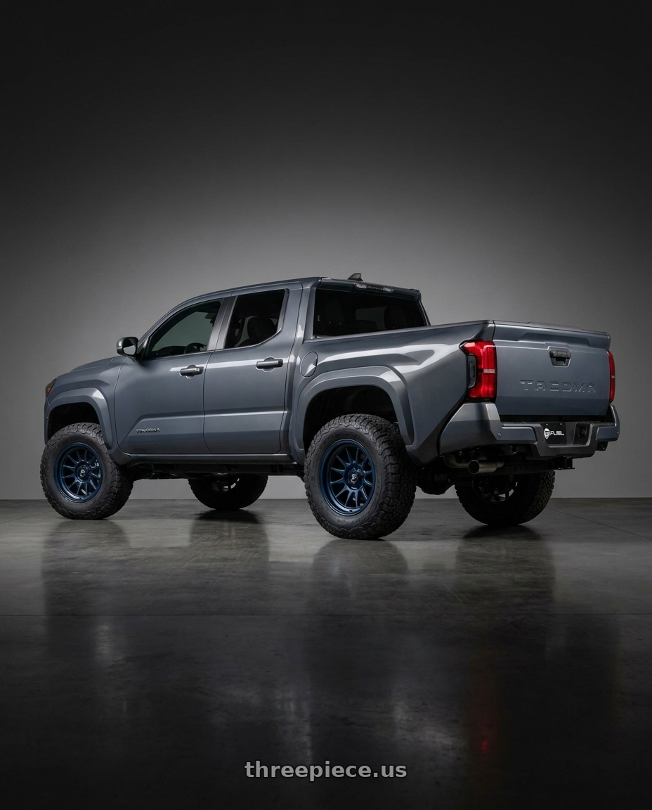 2024 toyota tacoma 4th gen sr 4 door with Fuel 1PC D781 RUSH 6X139.7 17X9 +1 DARK BLUE wheels rear three quarter view meaty tires