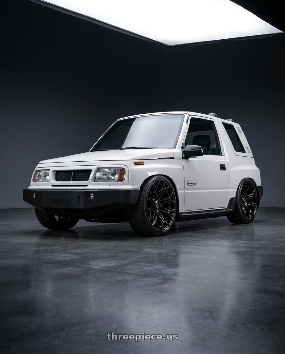1993 Geo Tracker with 4PLAY 4P83 5x127/5x139.7 22x12-44 Brushed wheels