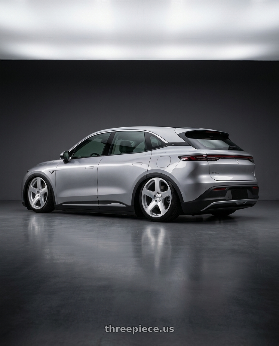 2026 Foxtron bria with Rotiform RC200 NUE 5X120 20x8.5 +35 GLOSS SILVER W/ MACHINED FACE wheels rear three quarter view slight stretch tires