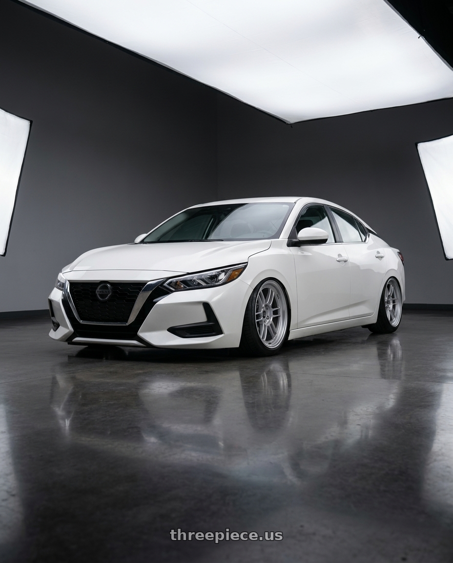 2022 Nissan sentra white with Enkei RPF1 5x114.3 18x8+35 Silver wheels