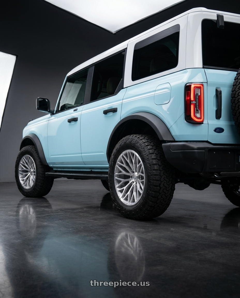 2025 Ford bronco with TIS 566BSM 6x139.7 17x9 +18 Brushed Silver & Milled wheels rear three quarter view square tires