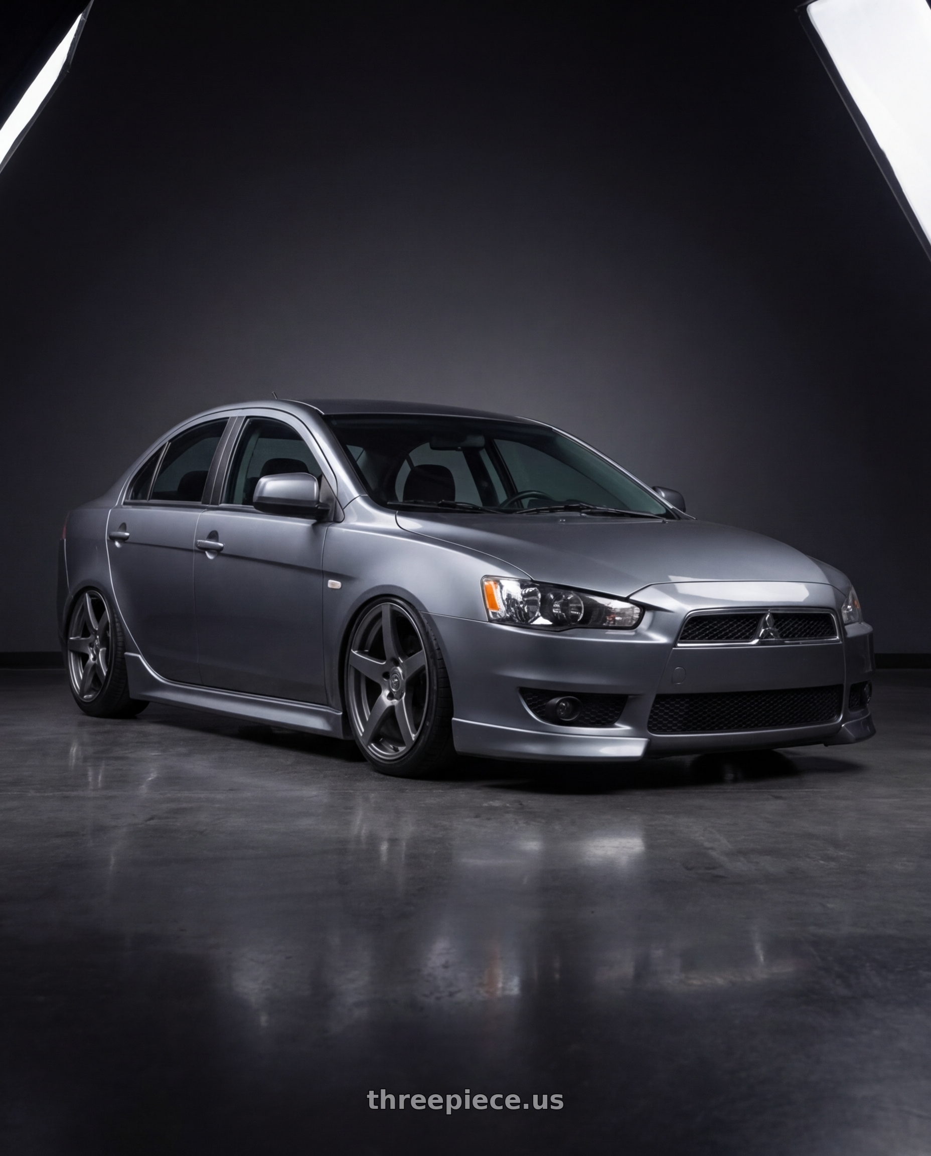 2014 Mitsubishi Lancer Ralliart with Forgestar CF5 5x114.3 18x10 +42 Gloss Anthracite wheels front three quarter view stanced stance