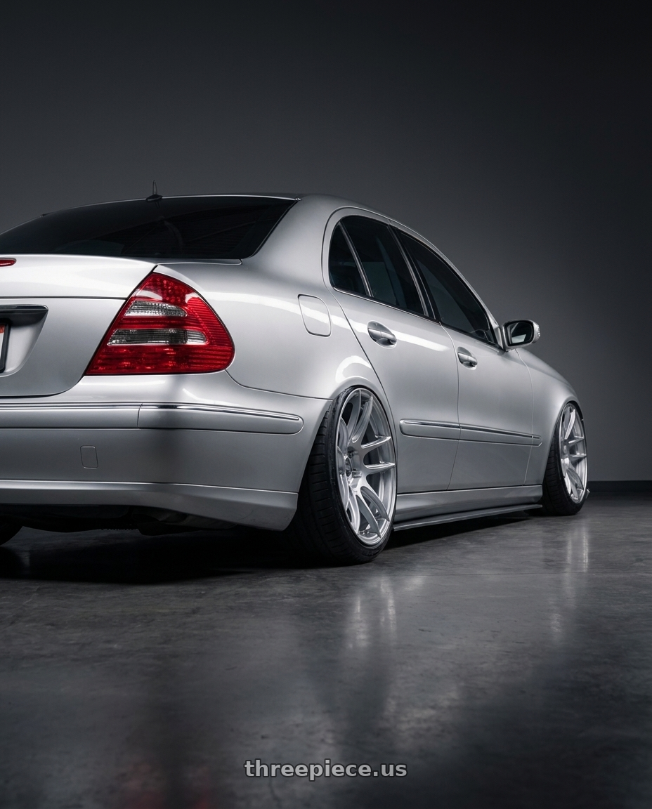 2006 Mercedes-Benz E500 with ESR Wheels CS SERIES CS8 5x112 18x10.5 +22 Hyper Silver wheels rear three quarter view slight stretch tires