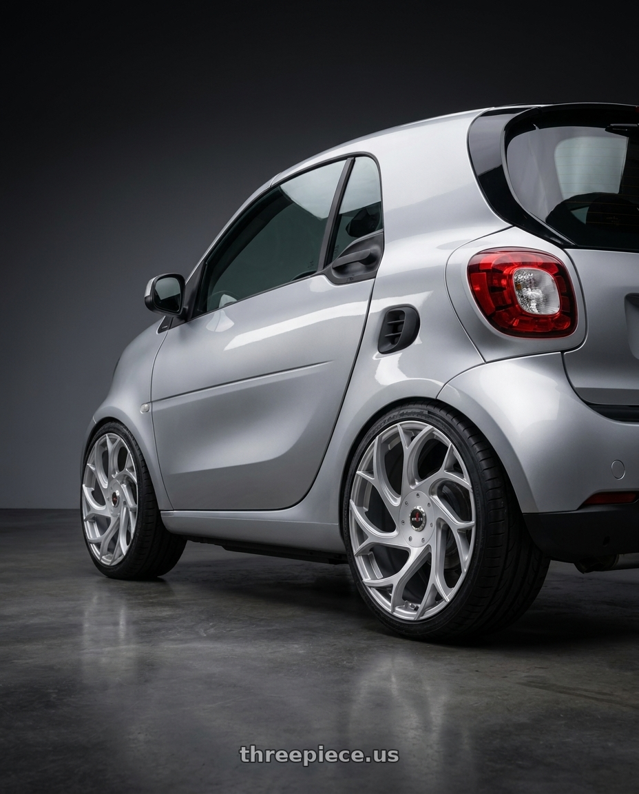 2018 smart for2 Cabrio with Ignite Inferno 5x114.3/5x120 24x8.5 +35 Silver wheels rear three quarter view meaty tires