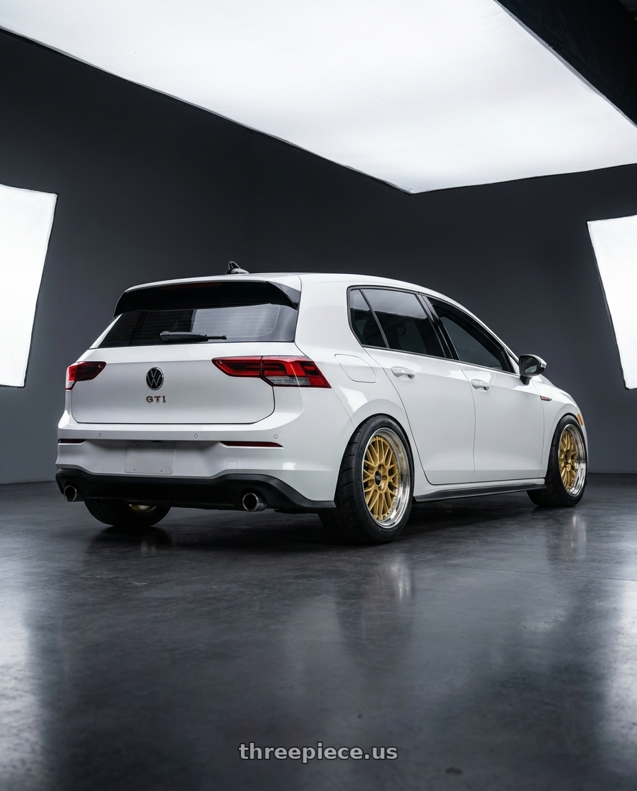 2022 VW GTI with BBS LM 5x114.3 18x9.0+42 Gold wheels rear three quarter view meaty tires