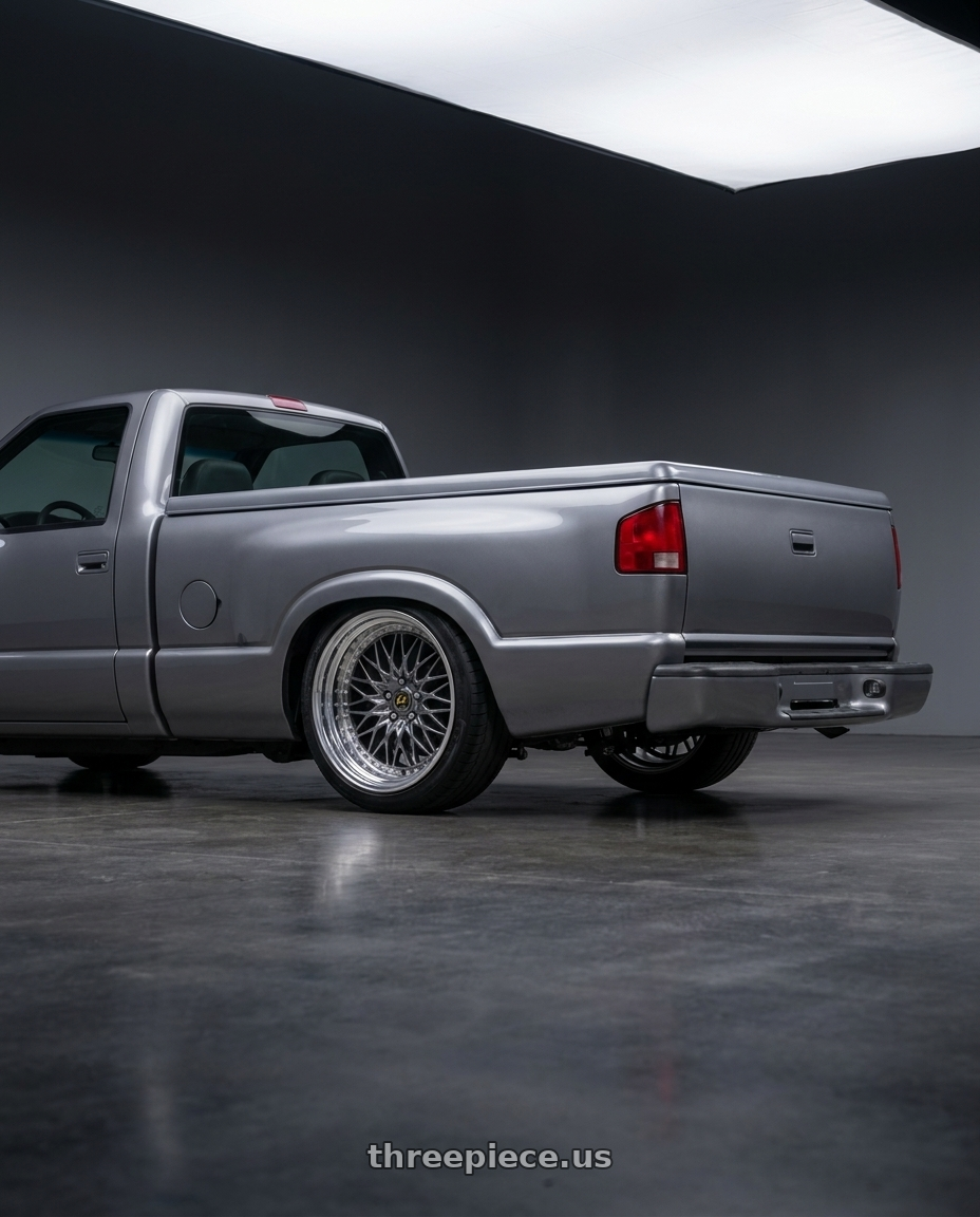1994 GMC Sonoma with Work Vs-Xv 5x120.65 20x9+28 A Disk Brilliant Silver Black wheels rear three quarter view slight stretch tires