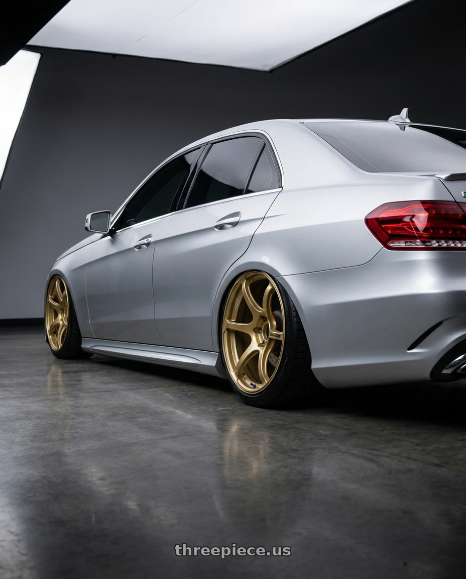 2014 Mercedes Benz E-350 with Advan RGIII 5x112 18x8+42 Gold wheels rear three quarter view square tires