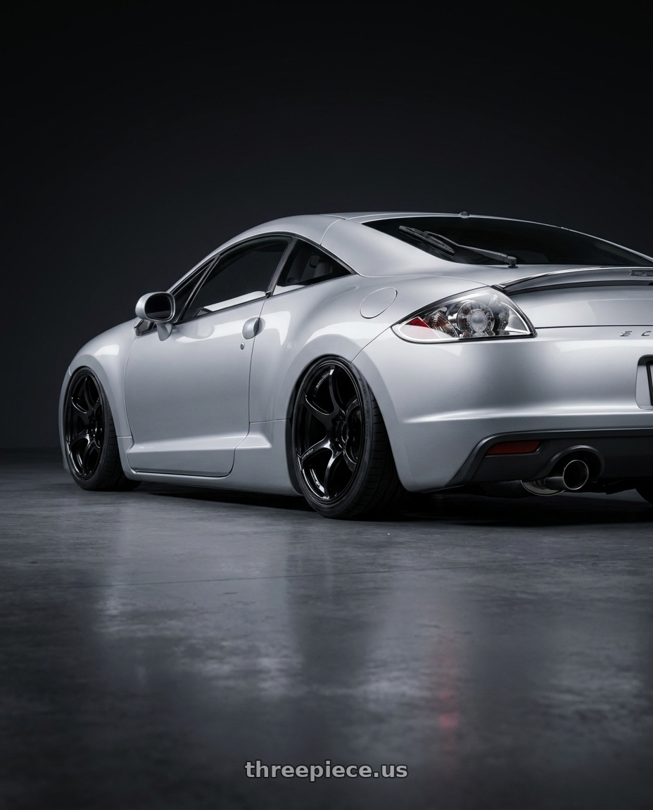 2010 Mitsubishi Eclipse with Advan RGIII 5x114.3 18x8.5+31 Gloss Black wheels rear three quarter view slight stretch tires