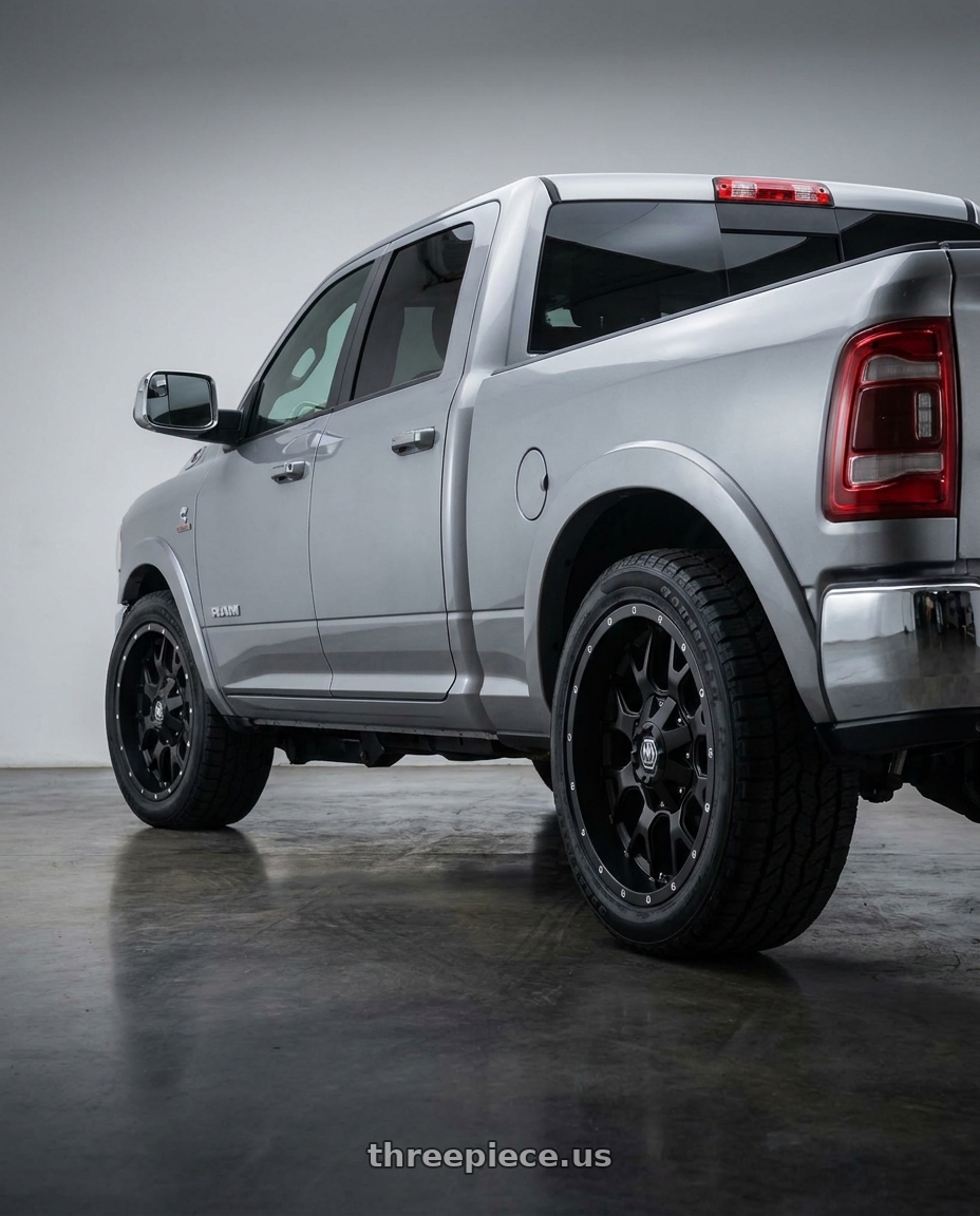 2026 Ram 2500 with MAYHEM WARRIOR 8015 MATTE BLACK 17x9 -165 .1 -12mm 130.8mm wheels rear three quarter view square tires