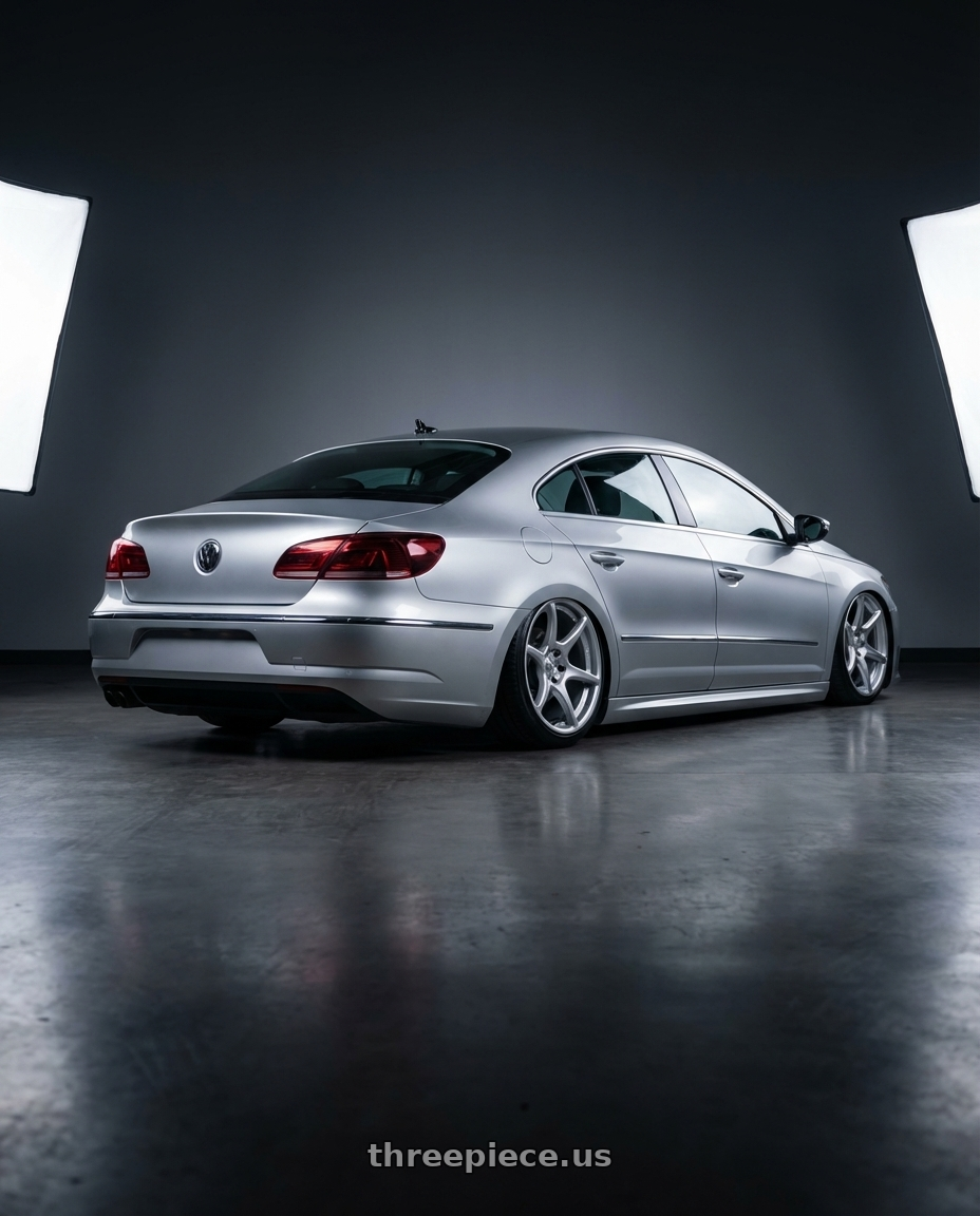 2015 Volkswagen CC with Kansei K11S Tandem 5X112 19x10.5 22 Hyper Silver wheels rear three quarter view slight stretch tires