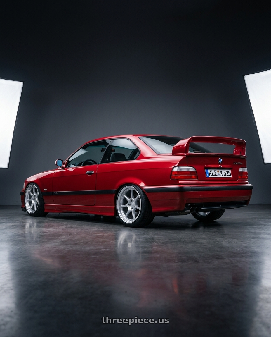 1996 BMW E36 328is with Motegi MR135 5X114.3 17X8.5 +35 HYPER SILVER wheels rear three quarter view square tires