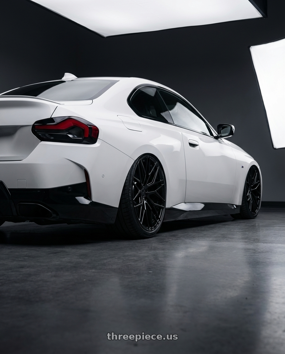 2024 BMW 2 Series G42 with Avant Garde Wheels M520R 5X112 19x9.5 +40 Gloss Black wheels rear three quarter view slight stretch tires