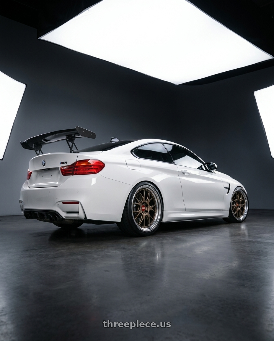 2016 F82 M4 with BBS LM-R 5x120 20x9.5+23 Matte Bronze wheels rear three quarter view slight stretch tires