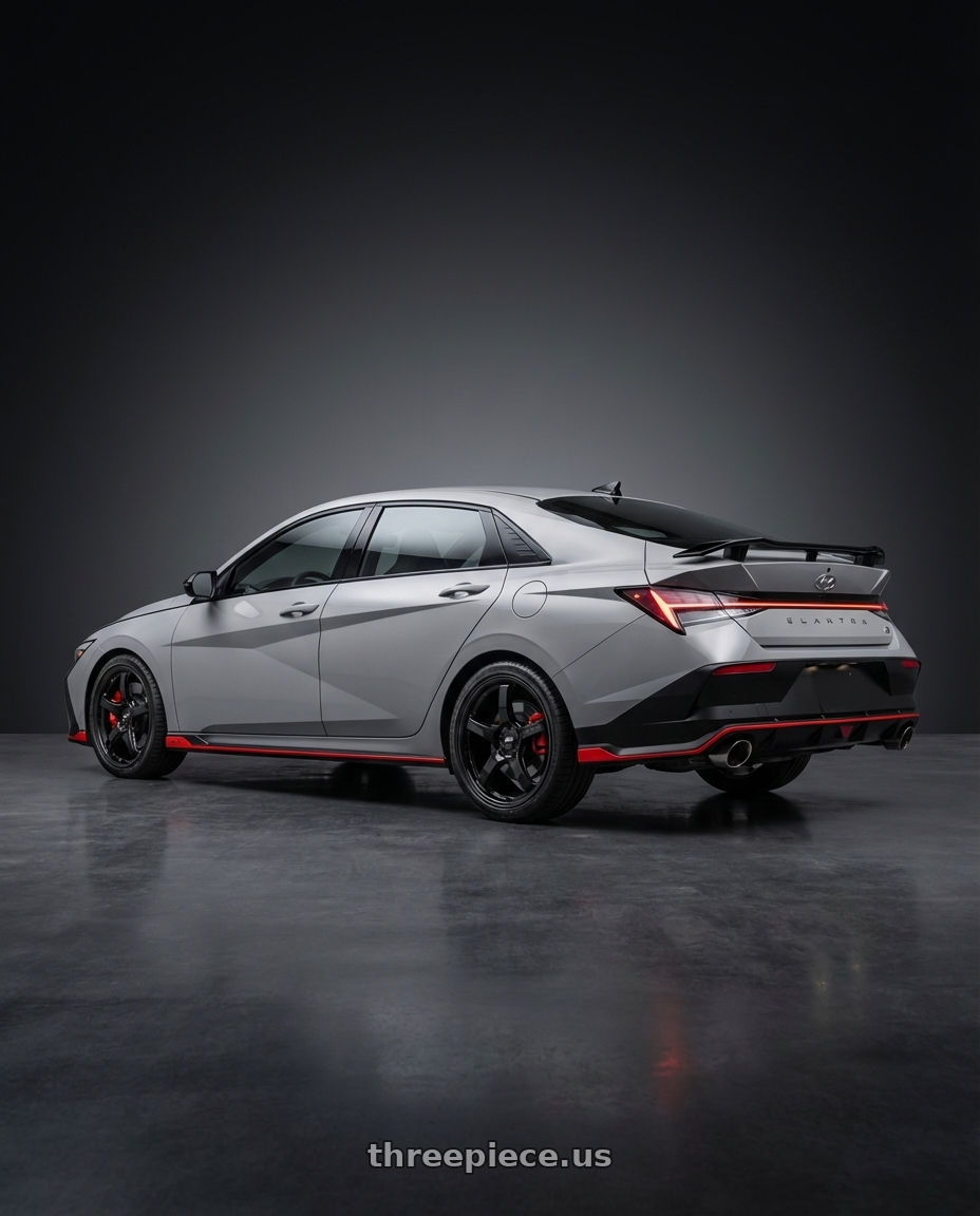 2024 Hyundai Elantra N Cyber Grey Facelift with Gram Lights 57CR 5x114.3 18x8.5+50 Glossy Black wheels rear three quarter view square tires