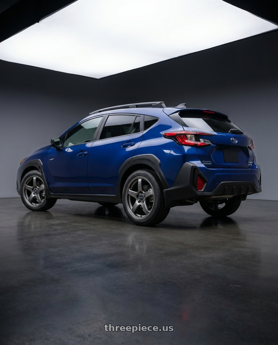 2026 Subaru Crosstrek with Enkei PF05 5x114.3 18x8+45 Dark Silver wheels rear three quarter view square tires