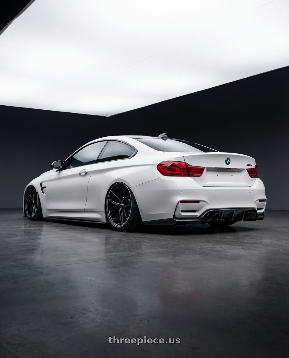2018 BMW M4 F82 with BBS CC-R 5x120 19x9.0+26 Satin Black wheels rear three quarter view slight stretch tires