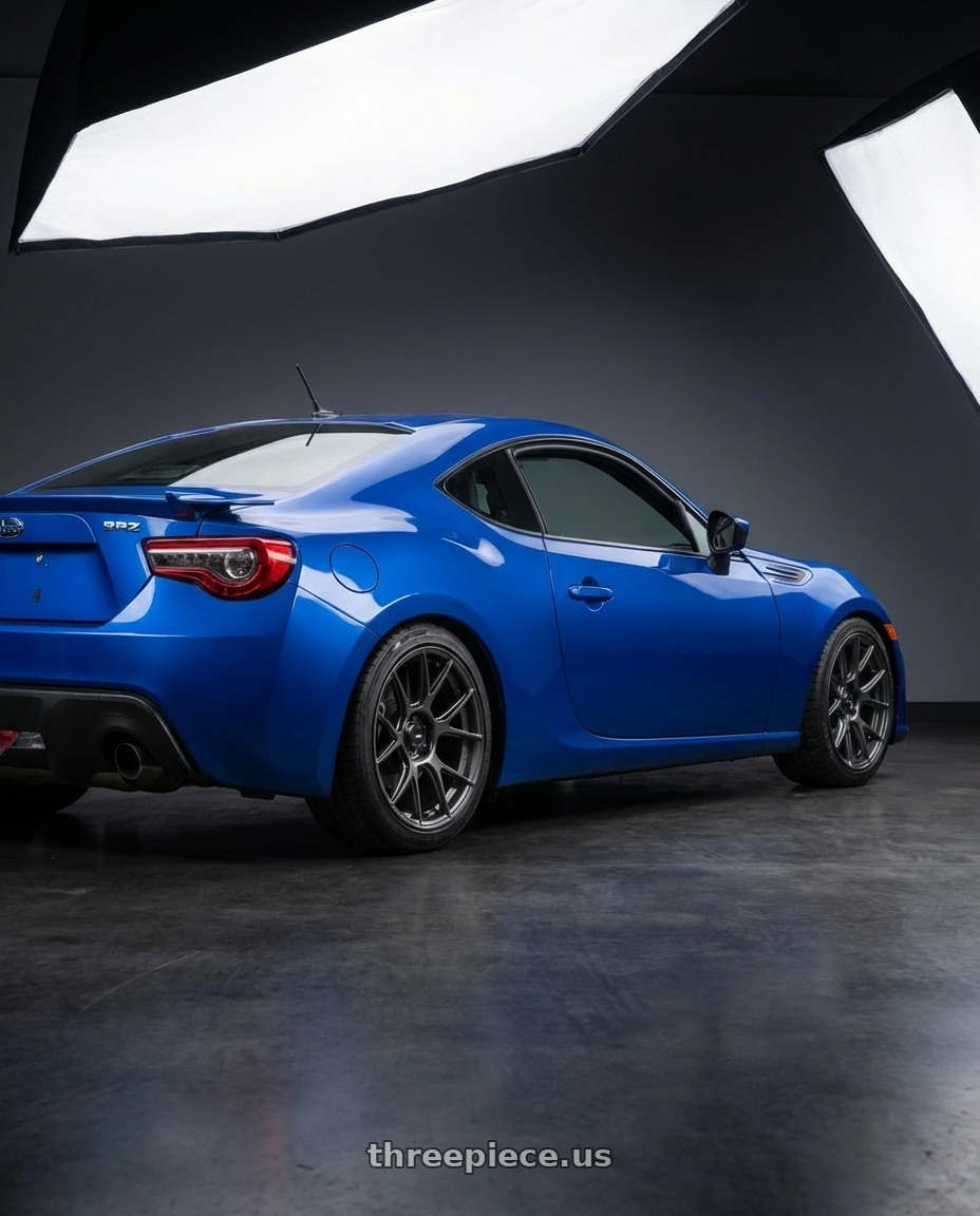 2017 Subaru BRZ with Konig Ampliform 5x100 17x9+40 Dark Metallic Graphite wheels rear three quarter view square tires