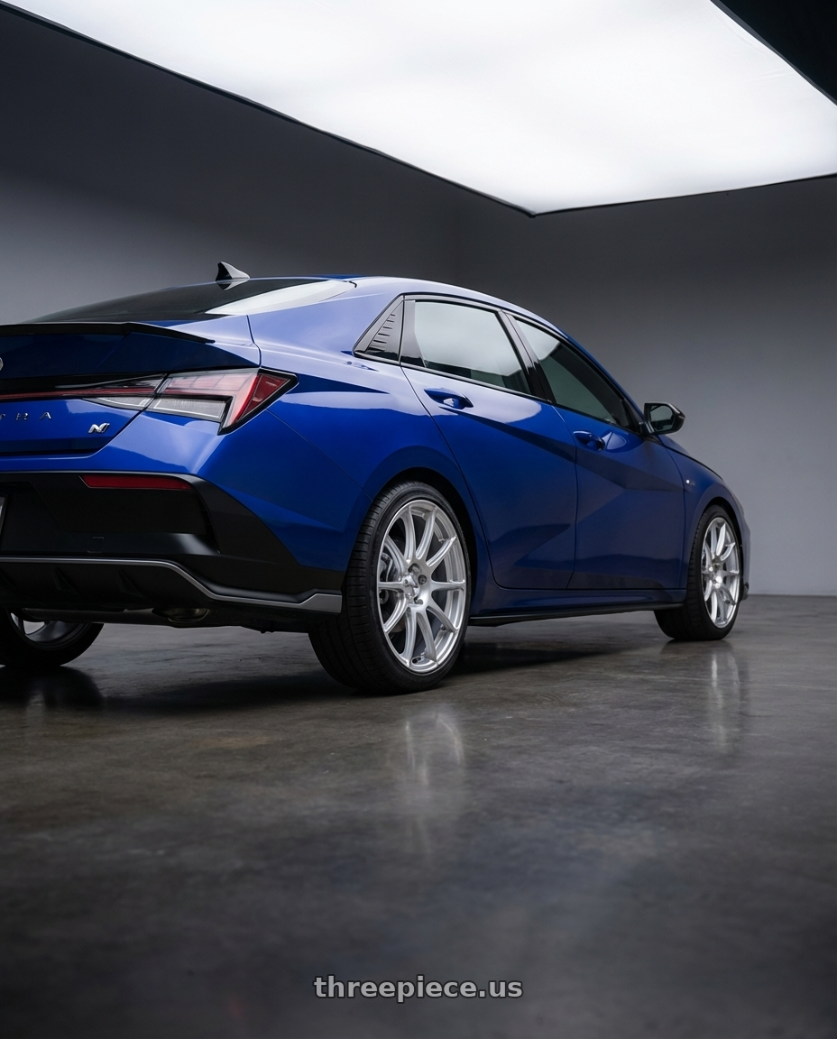 2025 Hyundai N-Line with Maxxim 10S Winner 4X100/4X108 17x7 +40 Full Silver wheels rear three quarter view square tires