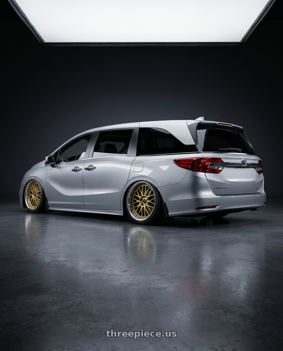 2024 Honda Odyssey  with Work Vs-Xx 5x120 20x8+37 A Disk Gold wheels rear three quarter view extreme stretch tires