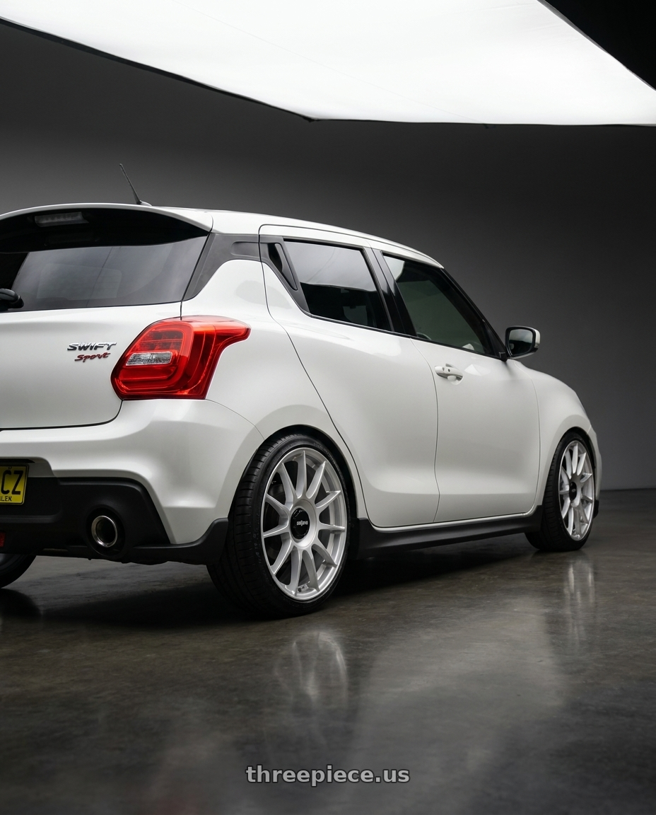 2024 Suzuki Swift  with Rotiform 1PC R170 DTM 5X108/5X114.3 17X8 +40 SILVER wheels rear three quarter view slight stretch tires