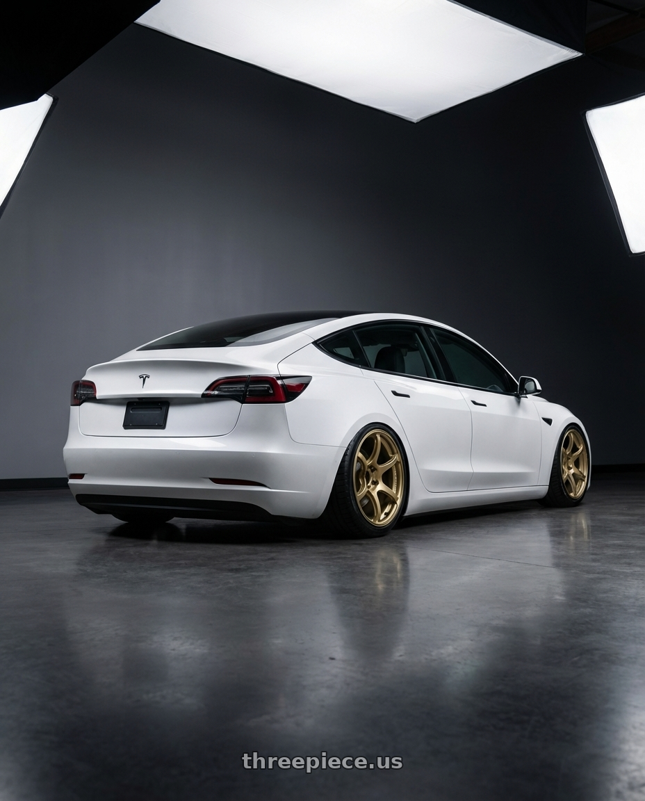 2023 Tesla Model 3 with Advan RGIII 5x114.3 19x9.0+25 Gold wheels rear three quarter view slight stretch tires