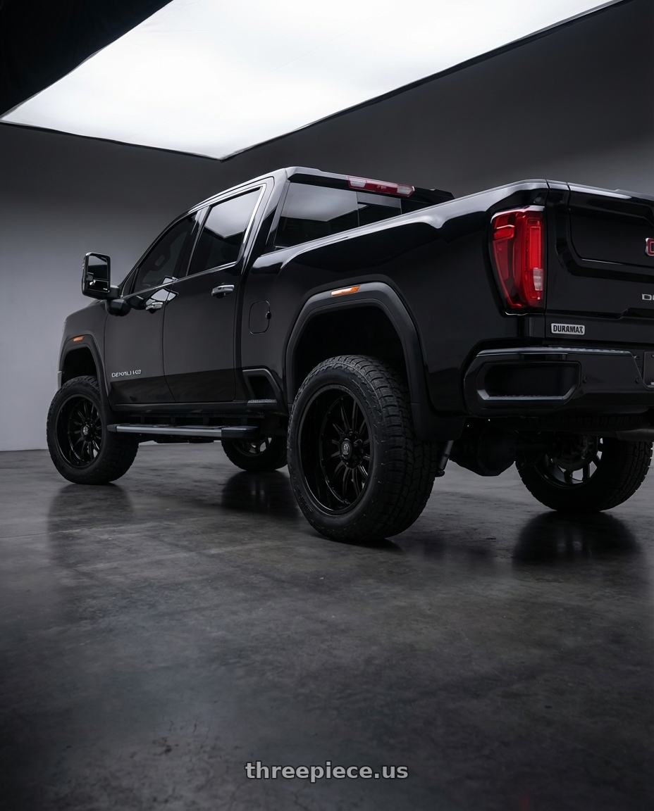 black 2020 gmc duramax 2500 hd denali with Axe CHRONUS 8x180 22X10 -19 GLOSS BLACK wheels rear three quarter view square tires