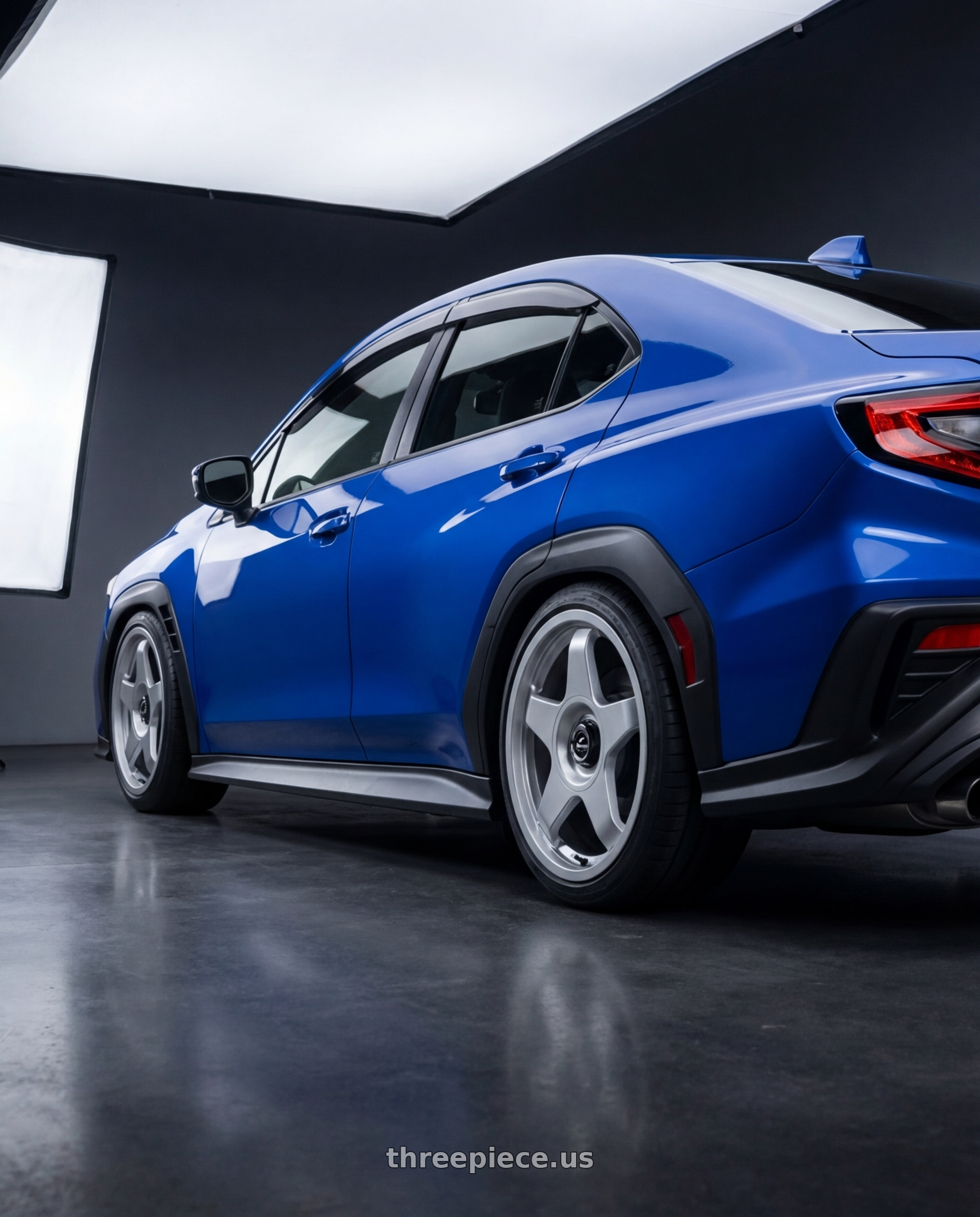 2024 Subaru WRX with fifteen52 CHICANE 5x114.3 / 5x100 18x8.5 +35 SPEED SILVER (GLOSS SILVER) wheels rear three quarter view square tires