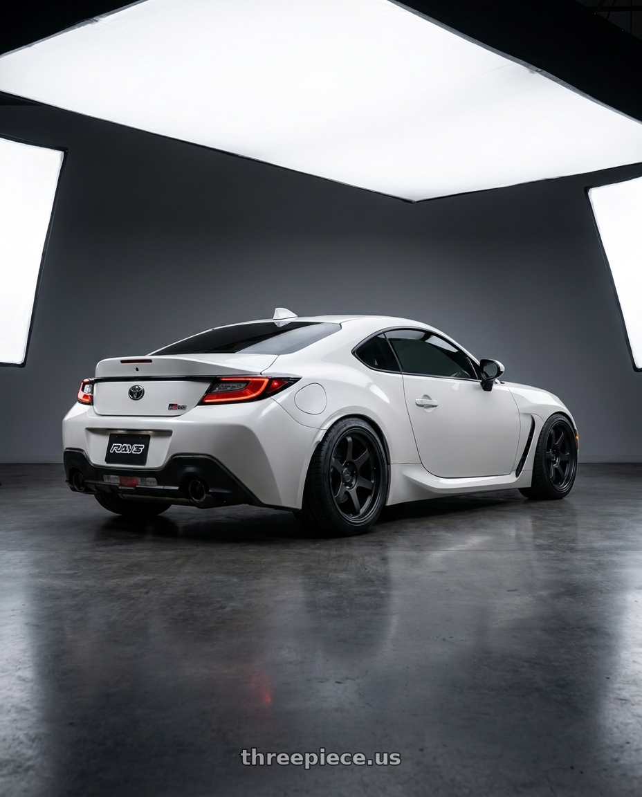 2024 toyota gr86 with Volk Racing RAYS D108 6x135 18x9 +0 MATTE BLACK wheels rear three quarter view square tires