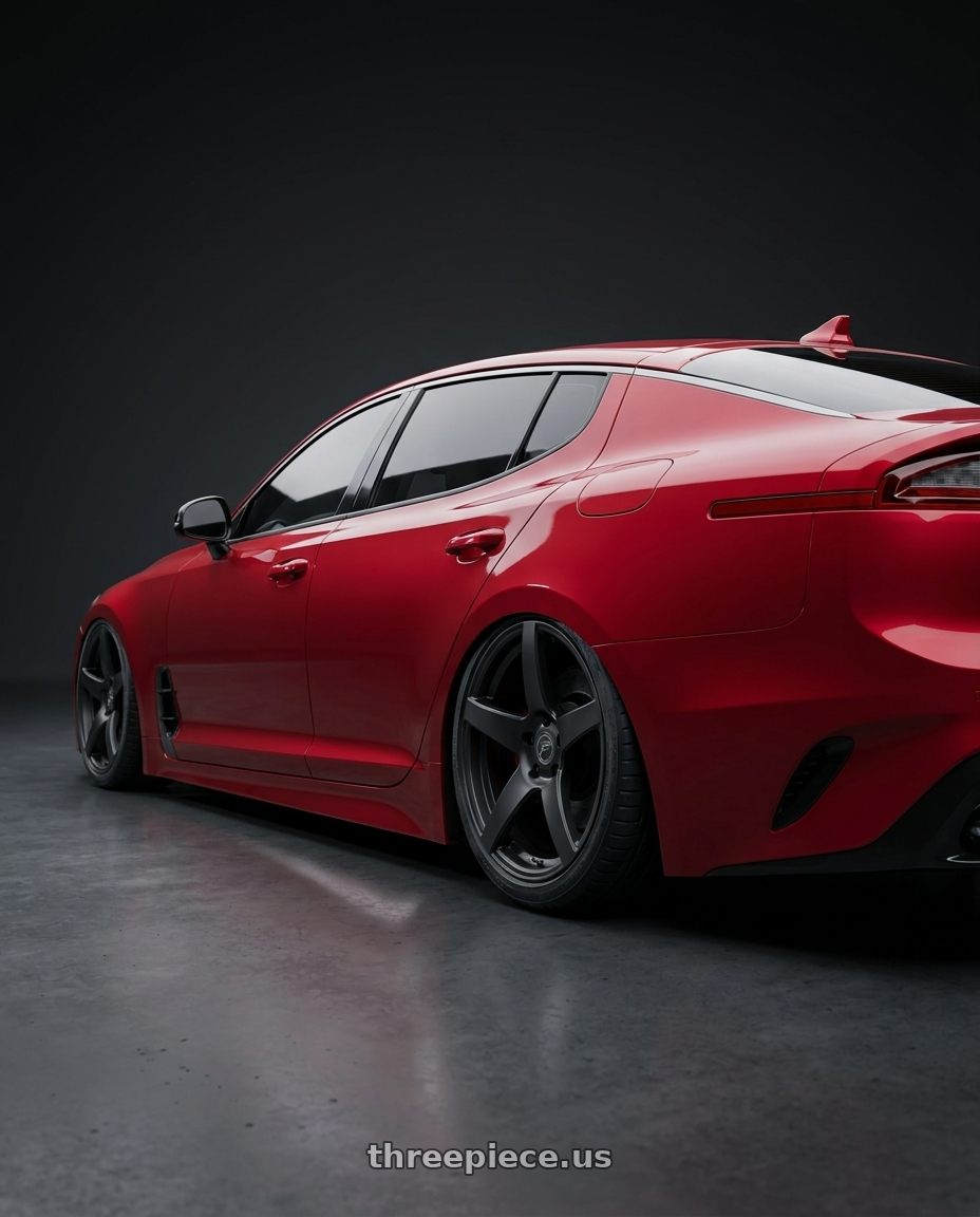 2022 Kia Stinger GT with Forgestar CF5 5x114.3 19x9.5 +29 Satin Black wheels rear three quarter view slight stretch tires