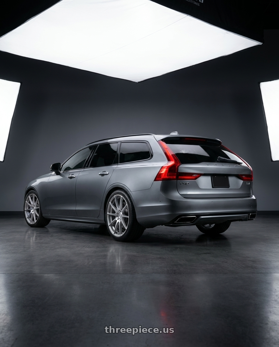 2019 Volvo v90 t6 r with MRR GF6 5x108 20x9  +38 Silver Machine Face wheels rear three quarter view square tires