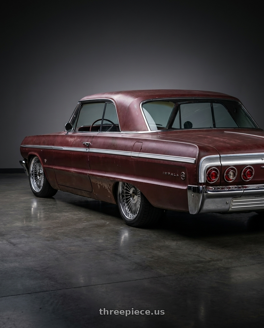 1964 Chevy impala with Work Emitz Black Polish 5x100 19x11.0 +22 wheels rear three quarter view square tires
