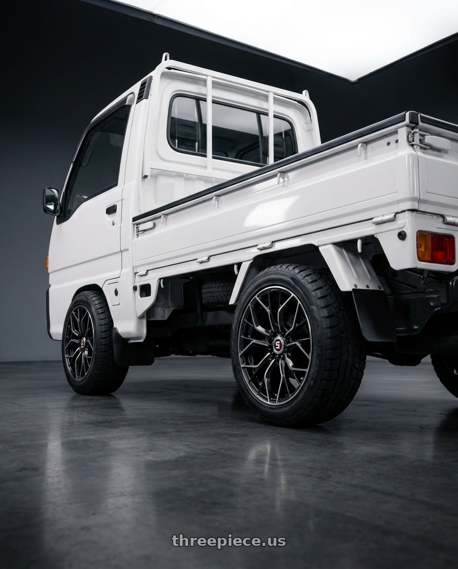 1994 Subaru Sambar with Spec-1 SP-76 4x100/4x114.3 14x6 +20 Gloss Black & Machined wheels rear three quarter view meaty tires