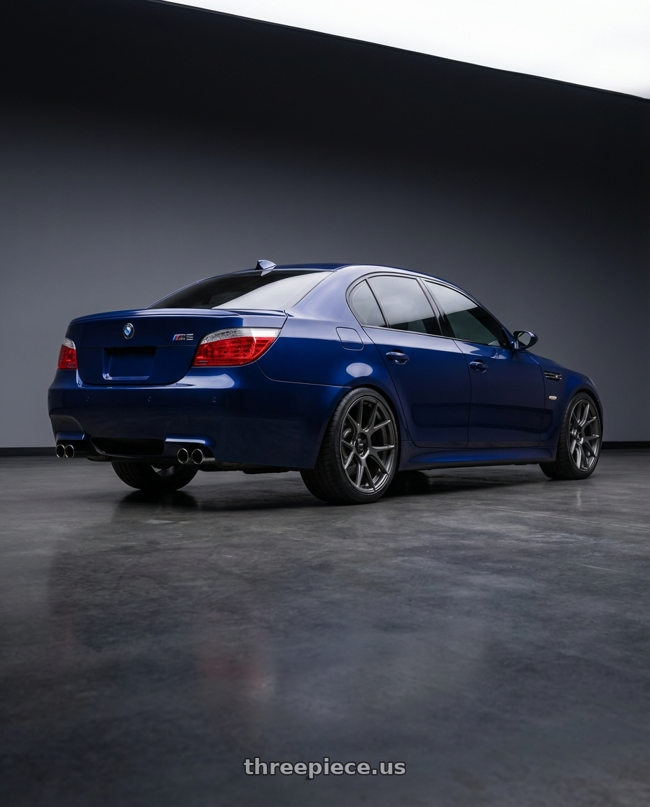 2010 BMW M5 E60 with Konig Ampliform 5x120 19x8.5+32 Dark Metallic Graphite wheels rear three quarter view square tires