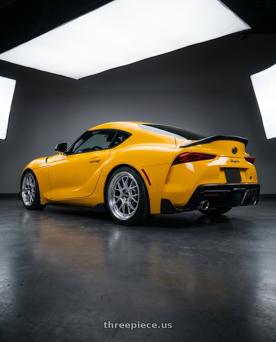 2022 Toyota Supra A91-CF Nitro with BBS LM-R 5x112 19x9.5+38 Diamond Silver wheels rear three quarter view slight stretch tires