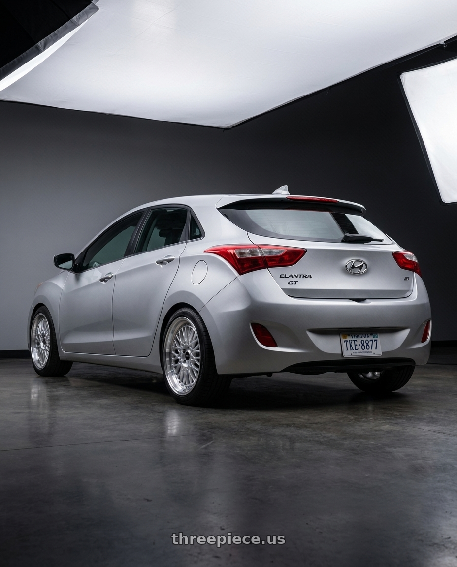 2014 Hyundai elentra with ARC AR1 5x114.3 17x8.5  +35 Silver Machine Face Lip Chrome Rivet wheels rear three quarter view square tires