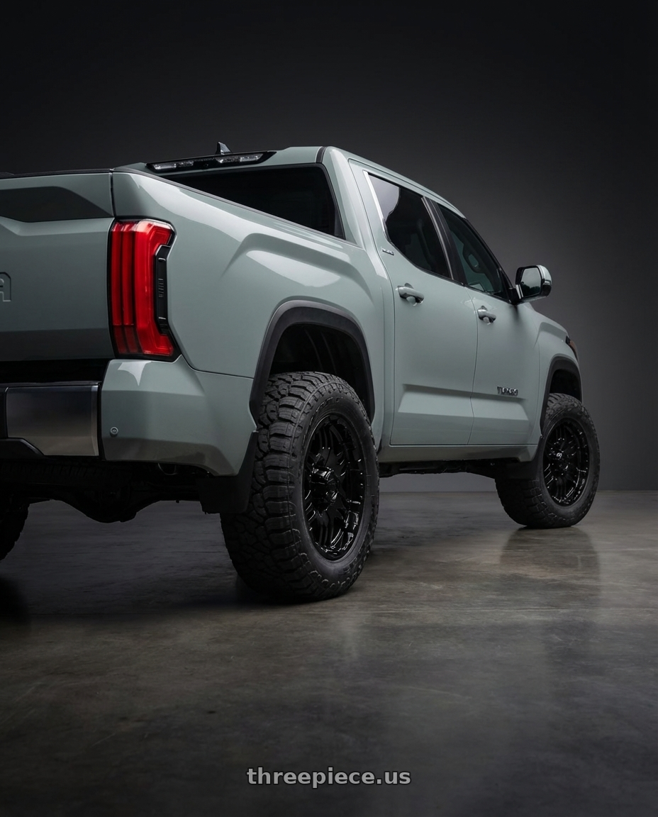 2024 Toyota Tundra with Gear Off Road 713B 6x139.7 20x9 +10 Gloss Black wheels rear three quarter view meaty tires