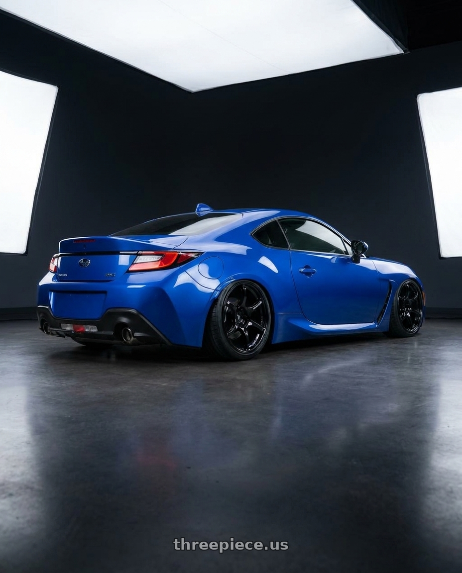 2024 Subaru BRZ with Advan RGIII 5x114.3 18x10.5+15 Gloss Black wheels rear three quarter view slight stretch tires