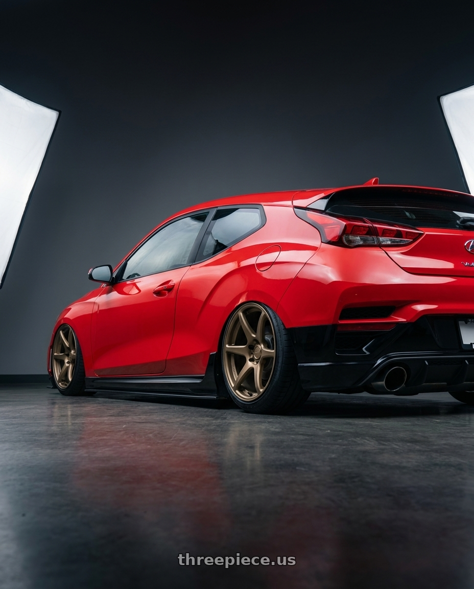 2022 Hyundai Veloster N with Kansei K11B Tandem 5x114.3 19x9.5 12 Bronze wheels rear three quarter view slight stretch tires