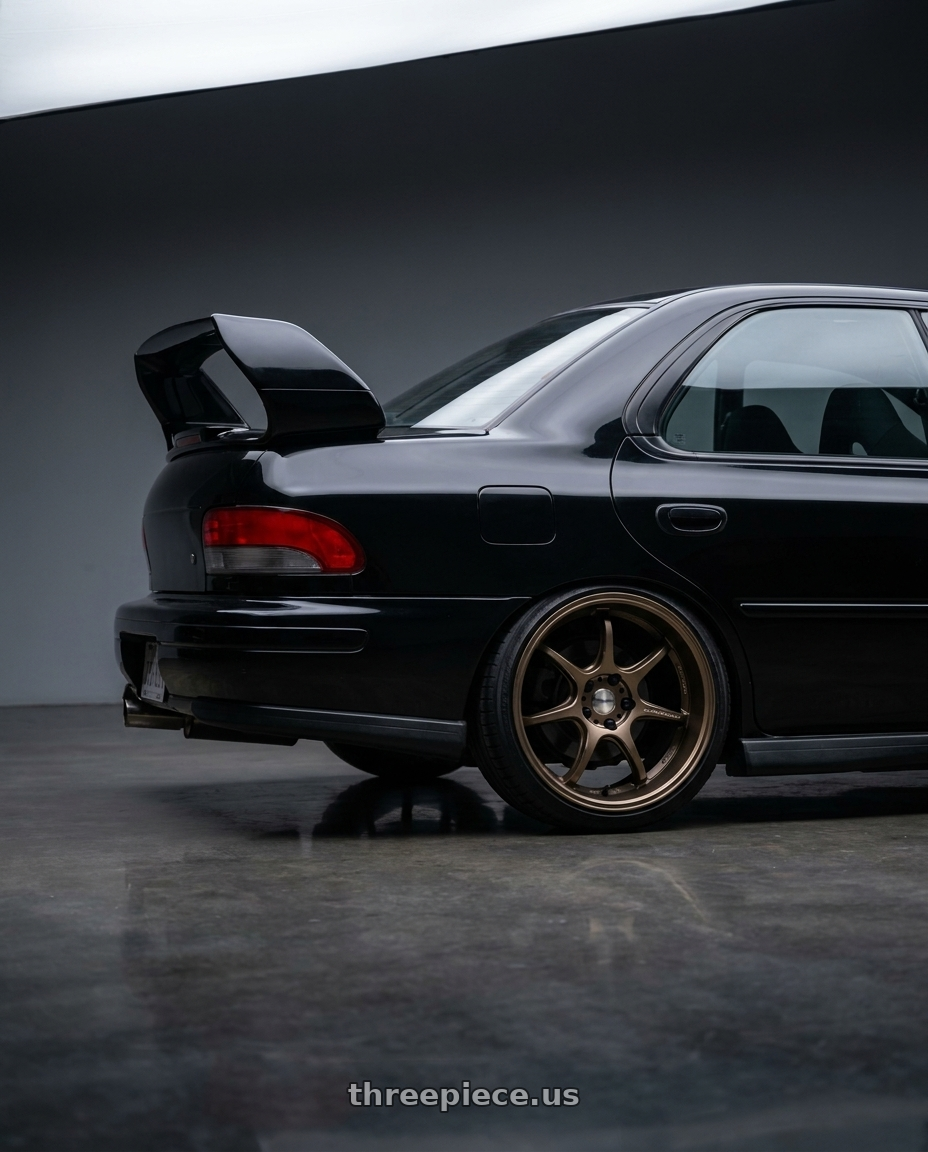 1998 Subaru Impreza GC8 with Work Emotion D9R wheels rear three quarter view slight stretch tires