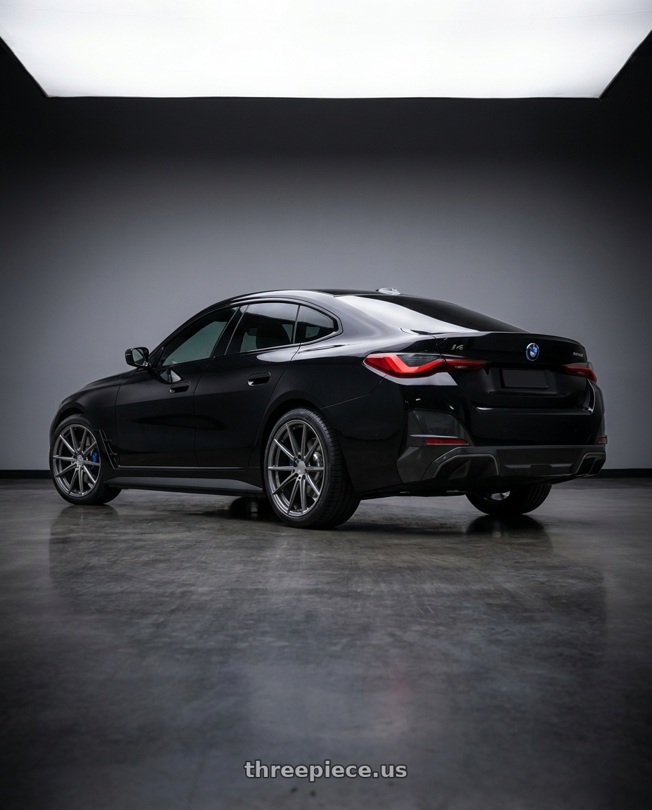 2023 bmw i4 edrive35 black with TSW BATHURST 5X112 20X10 +40 GLOSS GUNMETAL wheels rear three quarter view square tires
