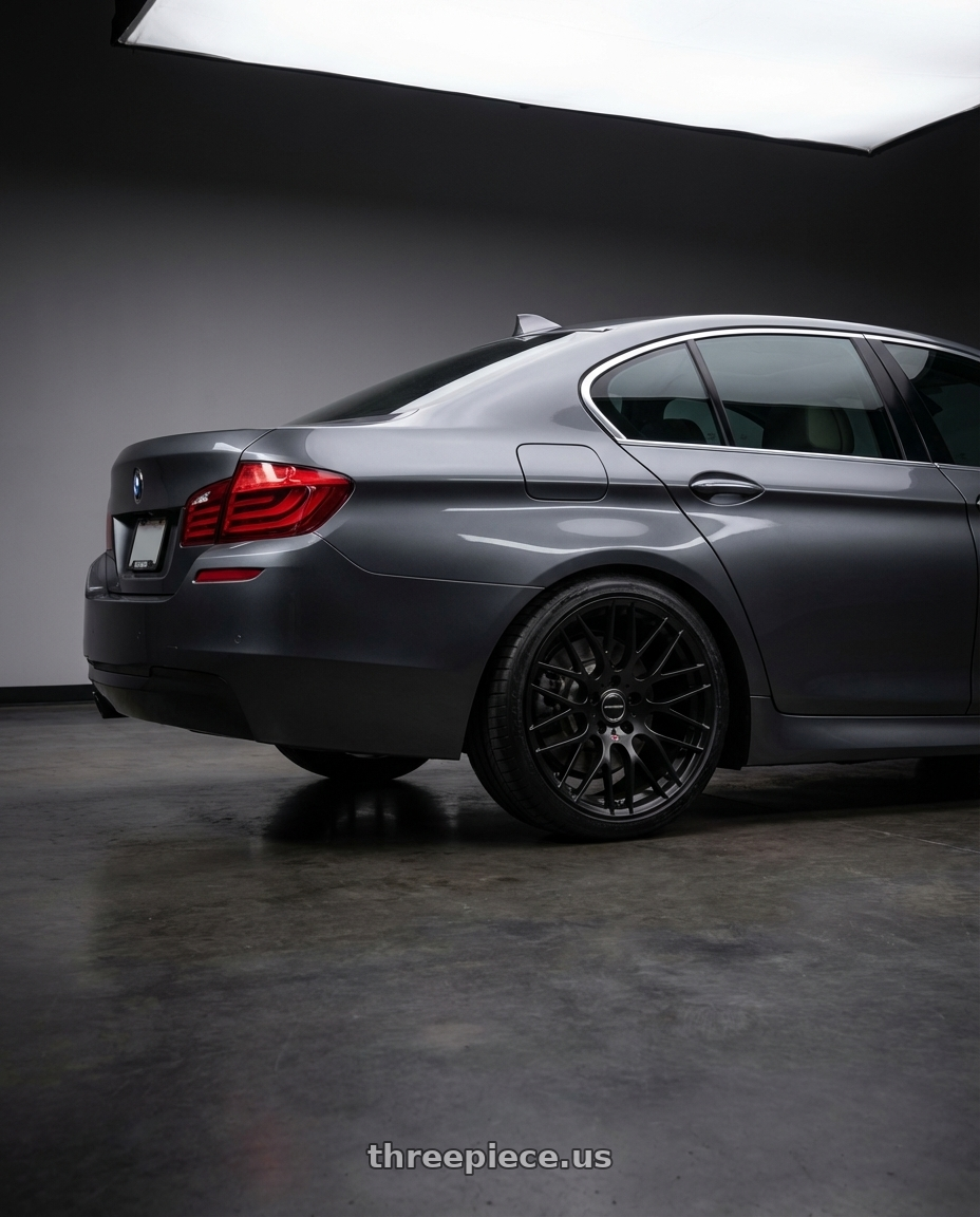 2016 BMW 5 Series F10 with Avant Garde Wheels M359 5X120 19x10 +38 Matte Black wheels rear three quarter view square tires