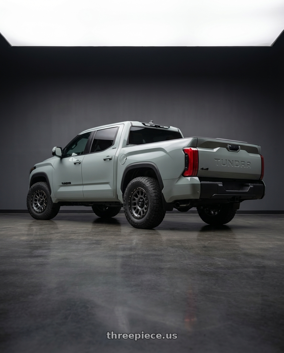 2024 Toyota Tundra with Vision Off-Road 111 Nemesis 6x139.7 20x9+0 Gunmetal wheels rear three quarter view meaty tires