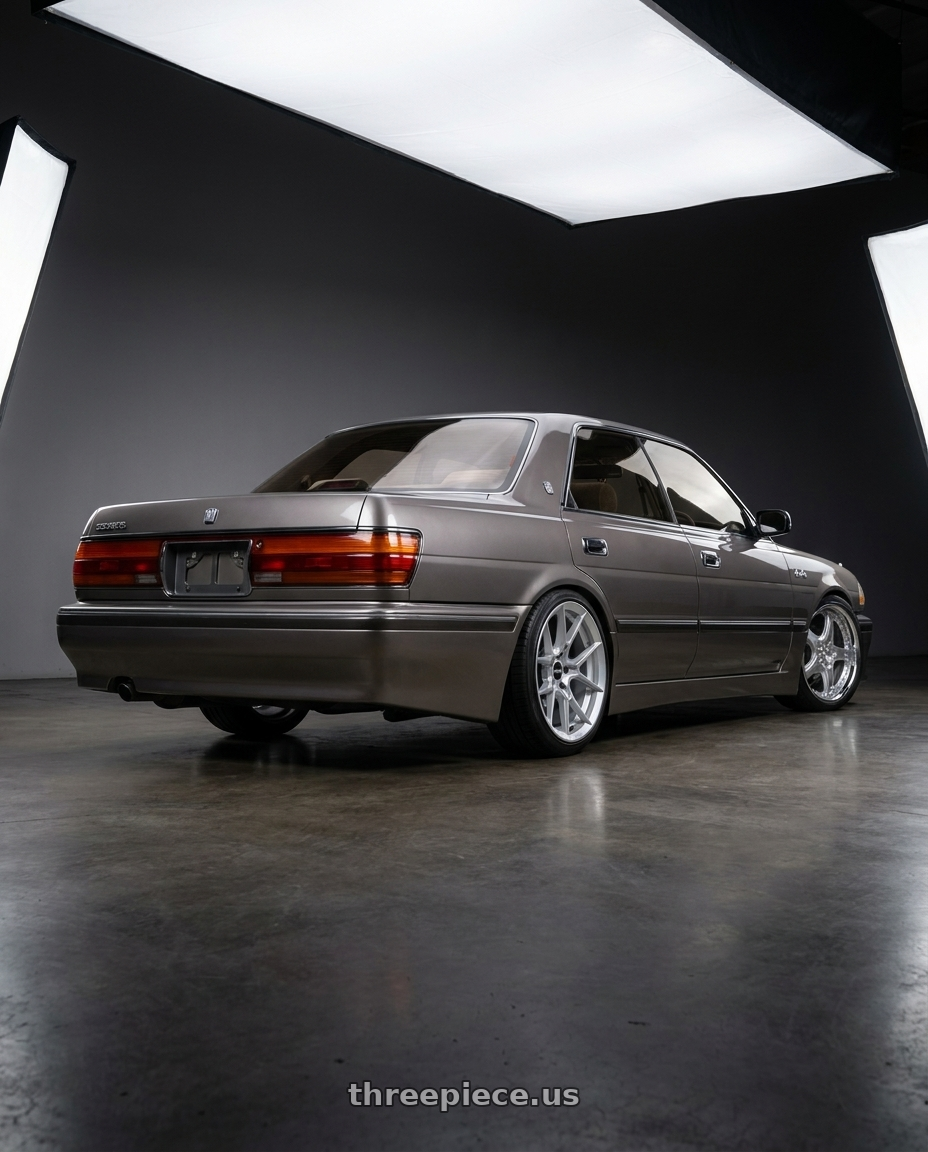 1990 Toyota crown with Rotiform RC199 KPR 5X112 20x9 +25 SILVER wheels rear three quarter view square tires