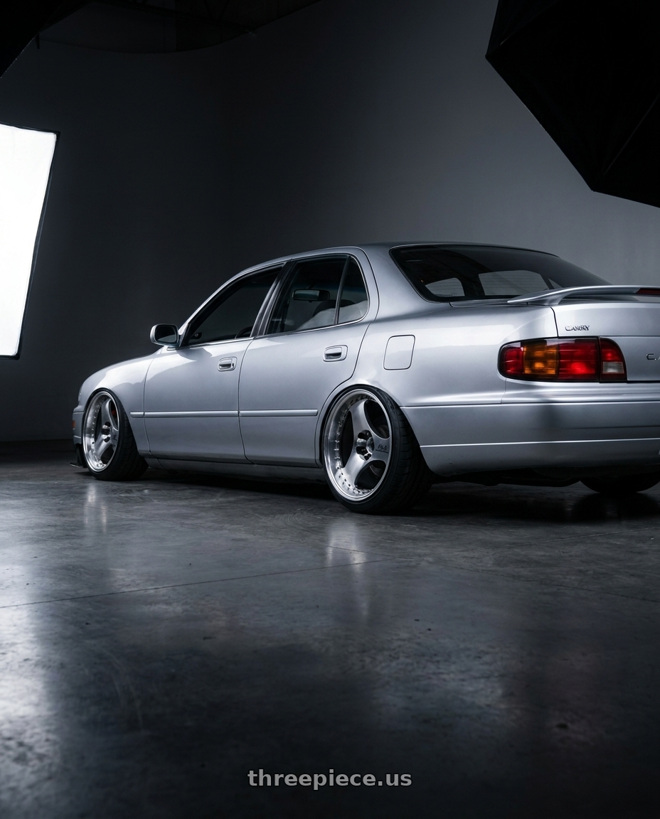 1994 TOYOTA CAMRY LE with Advan Racing ONI2 PROGRESSIVE 5x114.3 20x9.0 +39 MACHINING & DIAMOND CUT wheels rear three quarter view extreme stretch tires