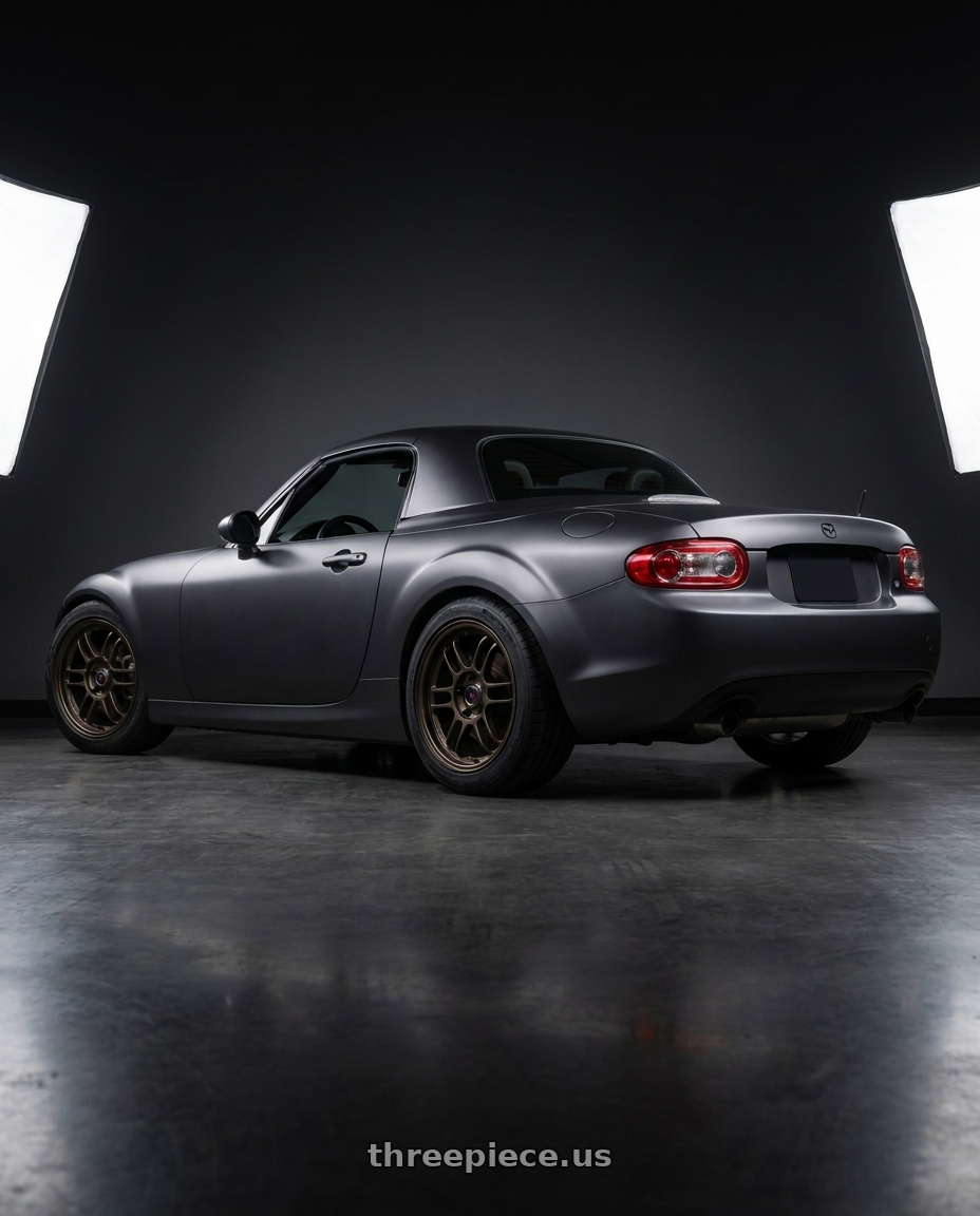 2007 Mazda Miata MX-5 with Volk Racing RAYS F6 BOOST 5x114.3 17x7+40 Dark Bronze wheels rear three quarter view square tires